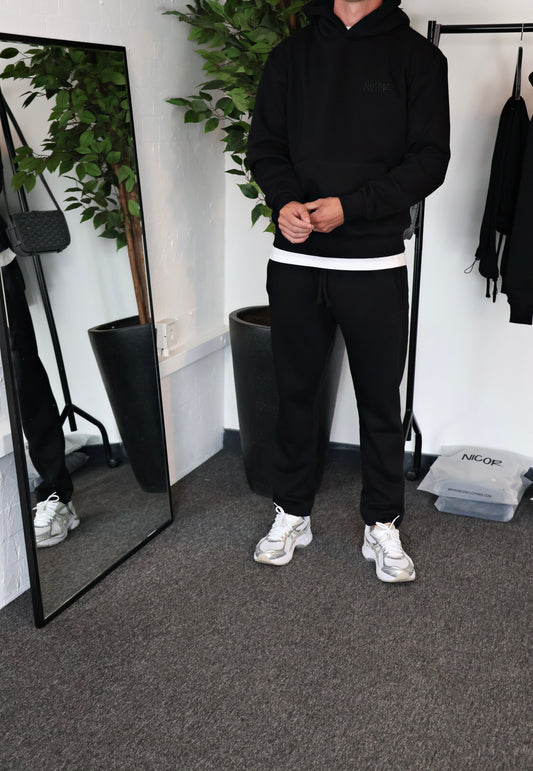 Triple black tracksuit.